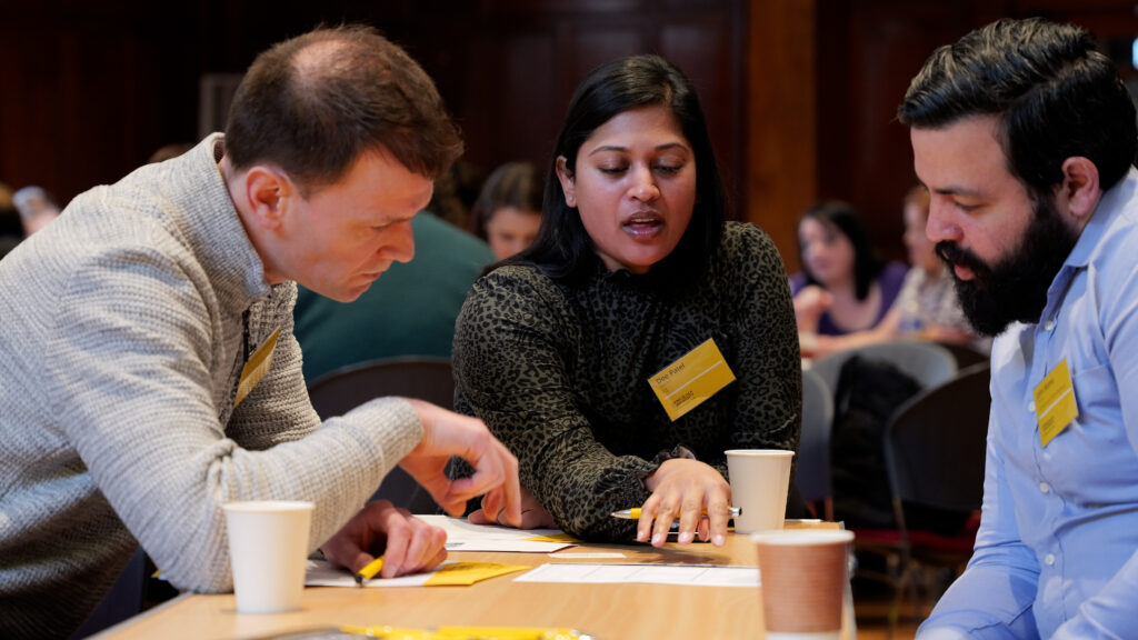 Delegates interacting at the Living Black at University Conference